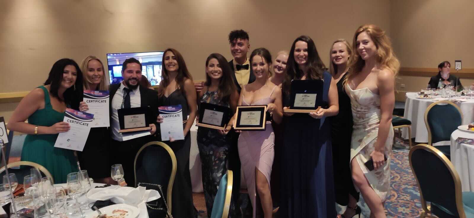 Rootz staff celebrate having picked up four awards at this year